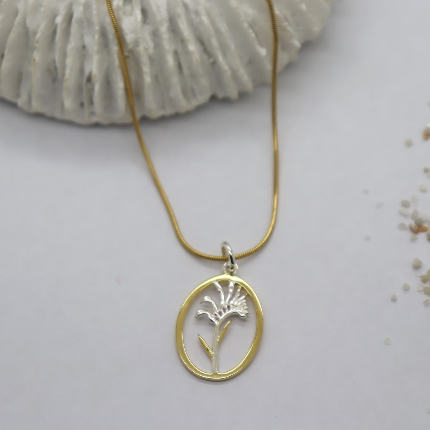 Kangaroo Paw Gold Rim Oval Necklace WHOLESALE